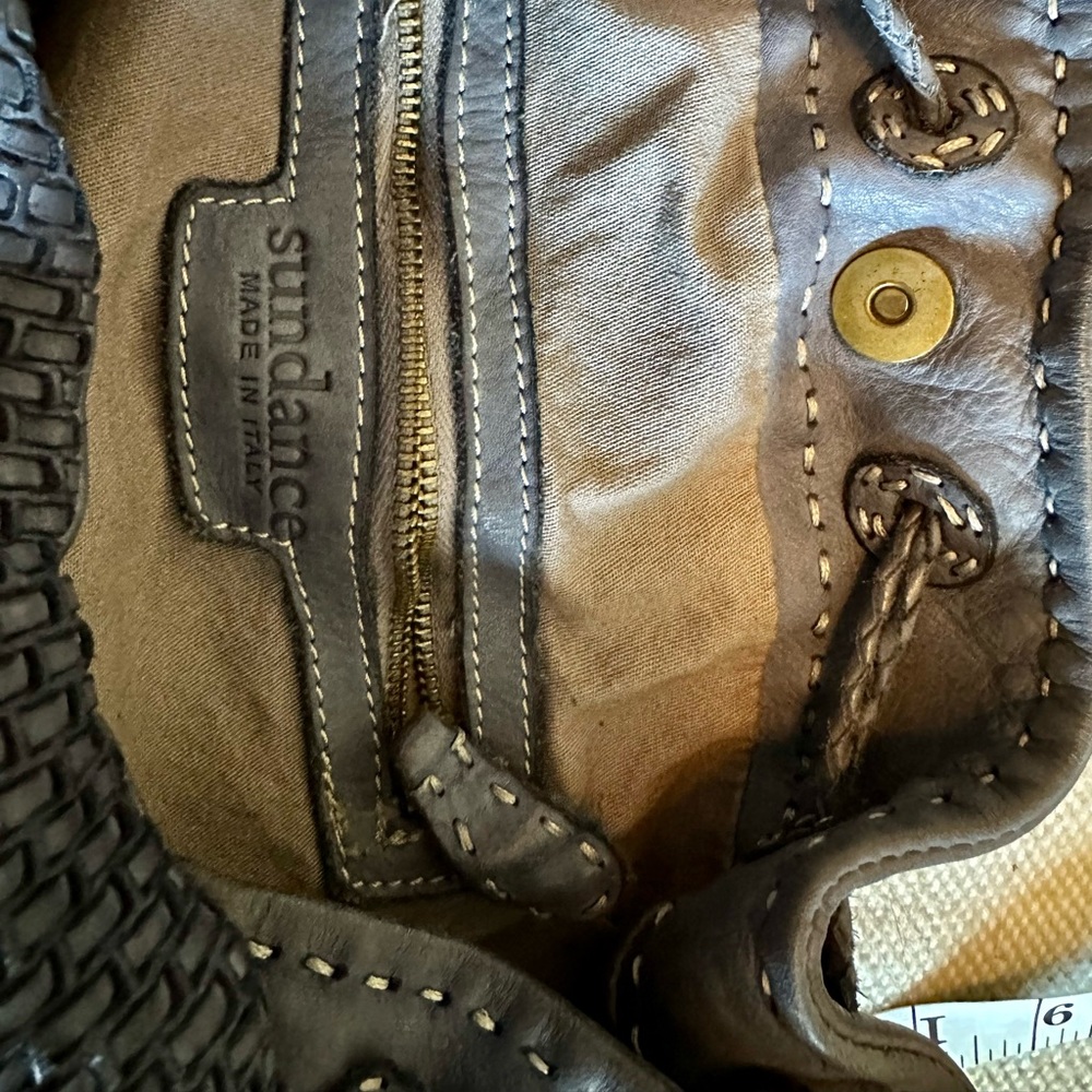 Woven leather drawstring bag